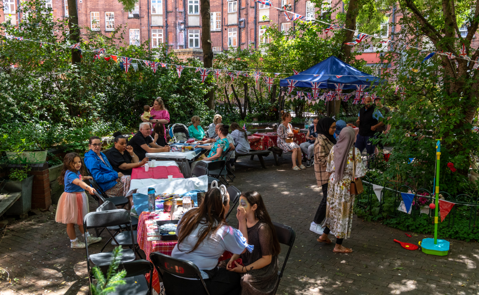 People sat outside at a social event